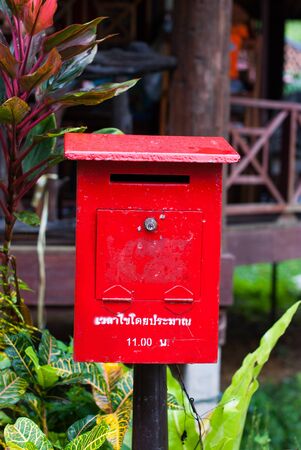 Red mailbox on a background isolated