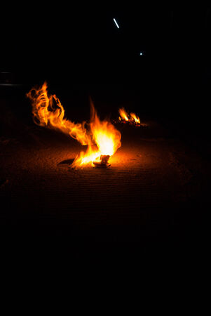 fire in the fire burns out of paper on concrete