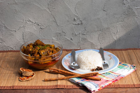 Pork Rib and rice with spicy curry In a glass bowlの写真素材