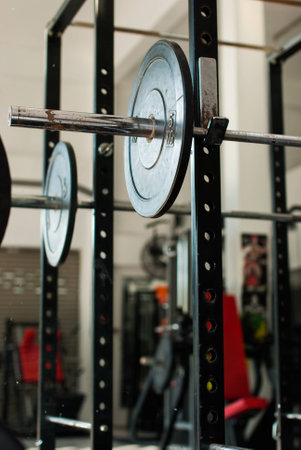 Weights on a rack in the gym Ranong , Thailand