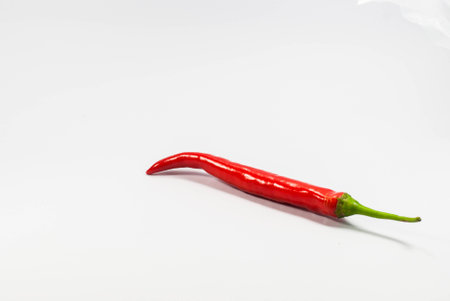 Red hot chili peppers, isolated on white close upの写真素材