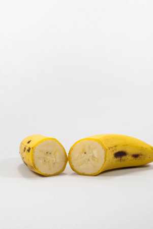 Ripe banana isolated on white background close upの写真素材