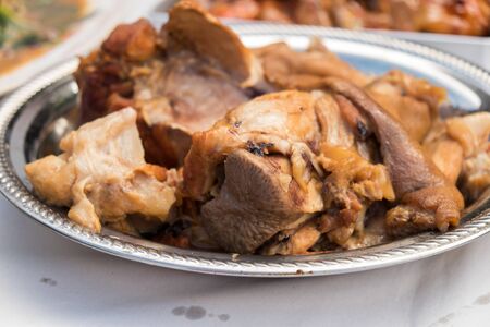 Steam pork leg with pepper in trayの写真素材