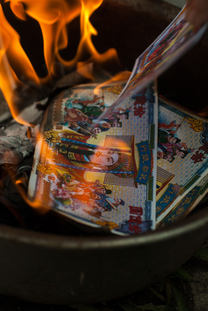 ancestor Worship on Chinese New Year and burning paper goldの写真素材