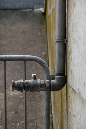 Old Water Plumbing Pipes with ValvesOld rusty pipes