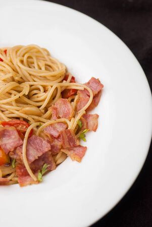 Spaghetti with dried chilli, bacon and garlicの写真素材