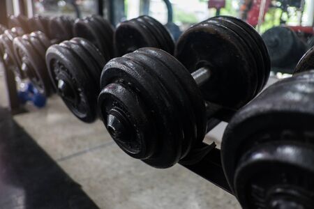 weight training in gym bodybuilding equipment close upの写真素材