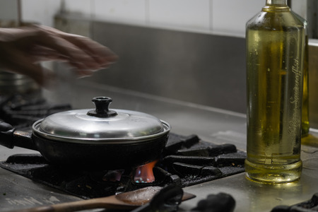 Beef Burger during cooking on pan