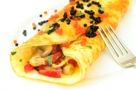 Healthy and Diet Food: Scrambled Eggs with Mushrooms and Vegetables. Studio Photo