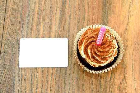 Cake with Cream and Cupcake. Studio Photo