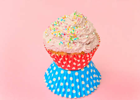 Cake with Cream, Cupcake on Pink Background. Studio Photoの写真素材