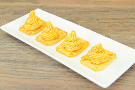 Forshmak: Herring with Butter, Carrots and Crackers. Studio Photo