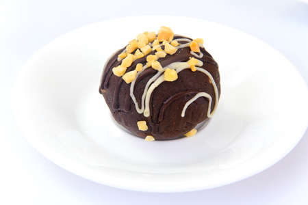 Sweetness: Chocolate Cake Potatoes on Plate. Studio Photo