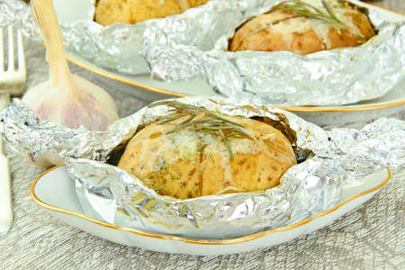 Healthy and Diet Food: Potatoes Roasted with Garlic and Ice Cream. Studio Photo.の写真素材