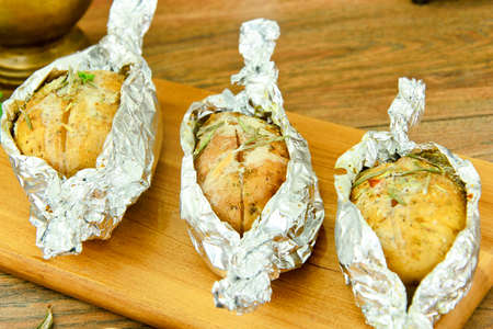 Healthy and Diet Food: Potatoes Roasted with Garlic and Ice Cream. Studio Photo.の写真素材