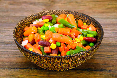 Mexican Mix of Vegetables. Tomatoes, Beans, Celery Root, Green Beans, Peas and Corn. Dietary Food Studio Photoの写真素材