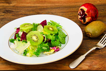 Salad Mix Batavian, Frise, Radicchio, Chicory and Kiwi, Dietary Meal Studio Photoの写真素材