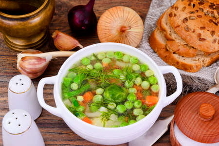 Soup with Cauliflower, Brussels Sprouts, Green Beans, Peas, Carrots and Mushrooms. Studio Photoの写真素材