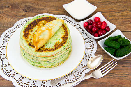 Tasty Pancakes Stack with Spinach Studio Photoの写真素材
