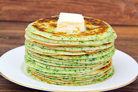 Tasty Pancakes Stack with Spinach Studio Photoの写真素材