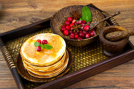 Tasty Pancakes with Cranberry Stack Studio Photo