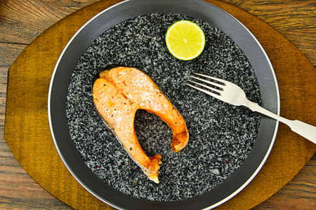 Salmon, lime, cream sauce with spinach Studio Photoの写真素材