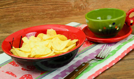 Potato Chips and Milk on Wood. Studio Photo