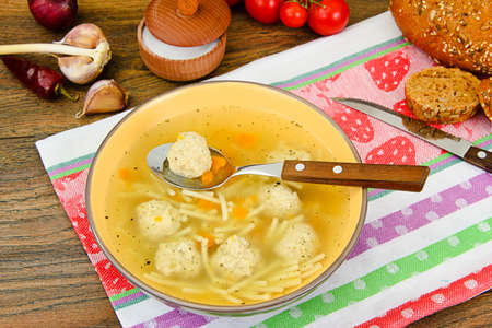 Soup with Chicken Meatballs and Noodles Studio Photo