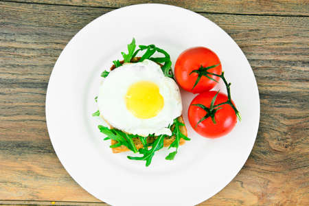 Scrambled Eggs with Arugula on Whole Grain Bread Health Foodの写真素材