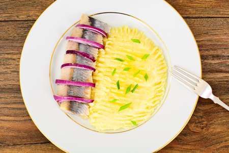 Mashed Potatoes with Herring and Red Pickled Onions Studio Photoの写真素材