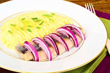 Mashed Potatoes with Herring and Red Pickled Onions Studio Photoの写真素材