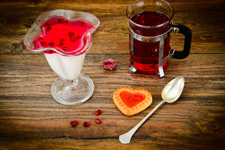 Sweet Tasty Pomegranate Jelly with Tea Studio Photoの写真素材