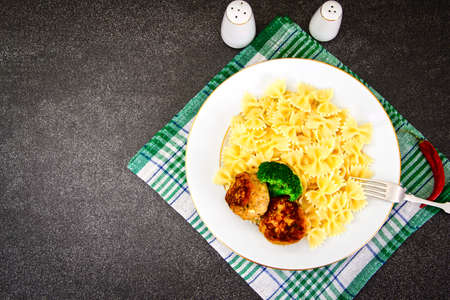 Cutlets with Pasta and Broccoli Studio Photo