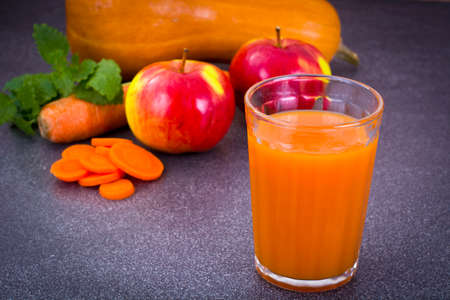 Sweet Tasty Vitamin Carrot, Pumpkin, Apple Juice Studio Photoの写真素材