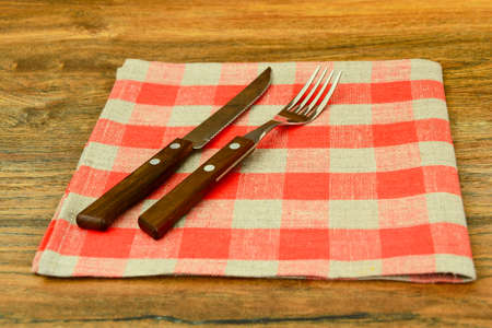 Kitchen Napkins Serving on Wood Background Studio Photoの写真素材