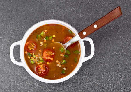 Spicy soup with curry, chili, cereals, rice and vegetables. Studio Photoの写真素材