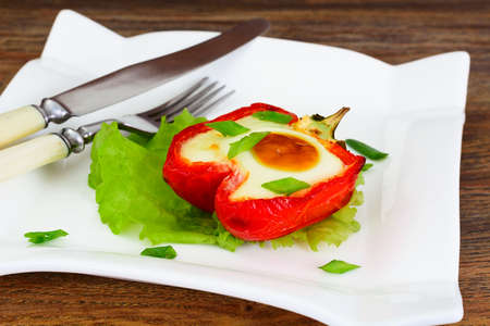 Dietary food without meat: egg, baked in sweet pepper. Studio Photoの写真素材