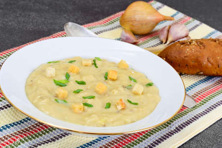 Healthy, diet food: Cream soup with mushrooms and vegetables with croutons and herbs. Studio Photoの写真素材