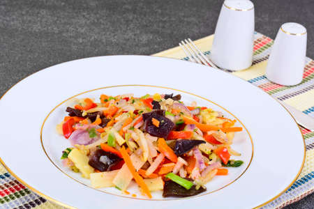 Healthy, diet: Mushrooms mun, bamboo shoots, soy sprouts, peppers and leeks with squid. Studio Photoの写真素材