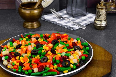 Mexican Mix of Vegetables. Tomatoes, Beans, Celery Root, Green Beans, Peas and Corn. Dietary Foodの写真素材