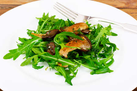 Salad and Arugula and Fried Oyster Mushrooms Studio Photoの写真素材