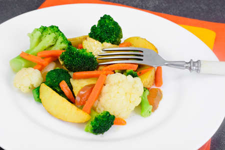 Steamed Vegetables Potatoes, Carrots, Cauliflower and Broccoli Studio Photoの写真素材