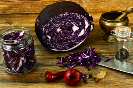 Red Cabbage on Wood Background with Knife. Studio Photoの写真素材