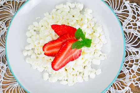 Home Dietary Fat Cottage Cheese Beaded Curd with Strawberry Studio Photoの写真素材