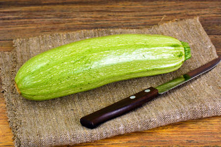 Fresh Green Zucchini on White Background Studio Photoの写真素材
