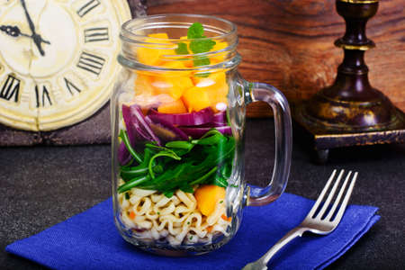 Pasta with Pumpkin, Arugula and Red Onion Studio Photoの写真素材