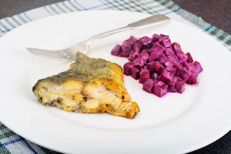 Fried Fish Cards and Salad of Boiled Beets with Yogurt Studio Photoの写真素材
