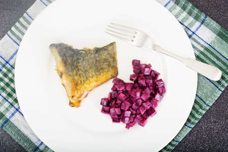 Fried Fish Cards and Salad of Boiled Beets with Yogurt Studio Photoの写真素材
