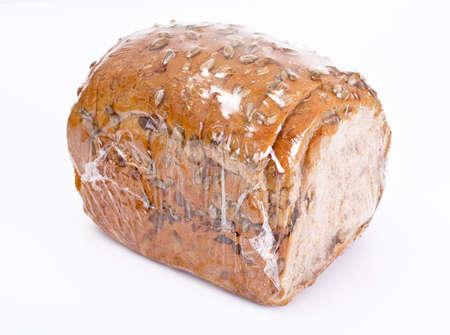 Healthy and diet food: rye bread with sunflower seeds. Studio Photo