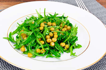 Salad of Arugula and Green Pea. Studio Photoの写真素材